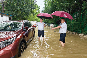 于风雨逆行中守望相助——广西华安“美莎克”台风理赔救灾纪实